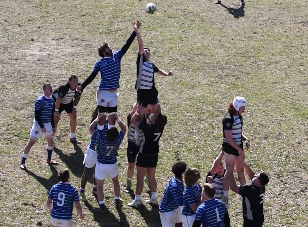 <p class="p1"><span class="s1"><strong>Will Allen extends his reach to keep possesion of the ball at the top of a lineout. Memphis rugby won nearly all of their lineouts in the loss to MTSU.</strong></span></p>