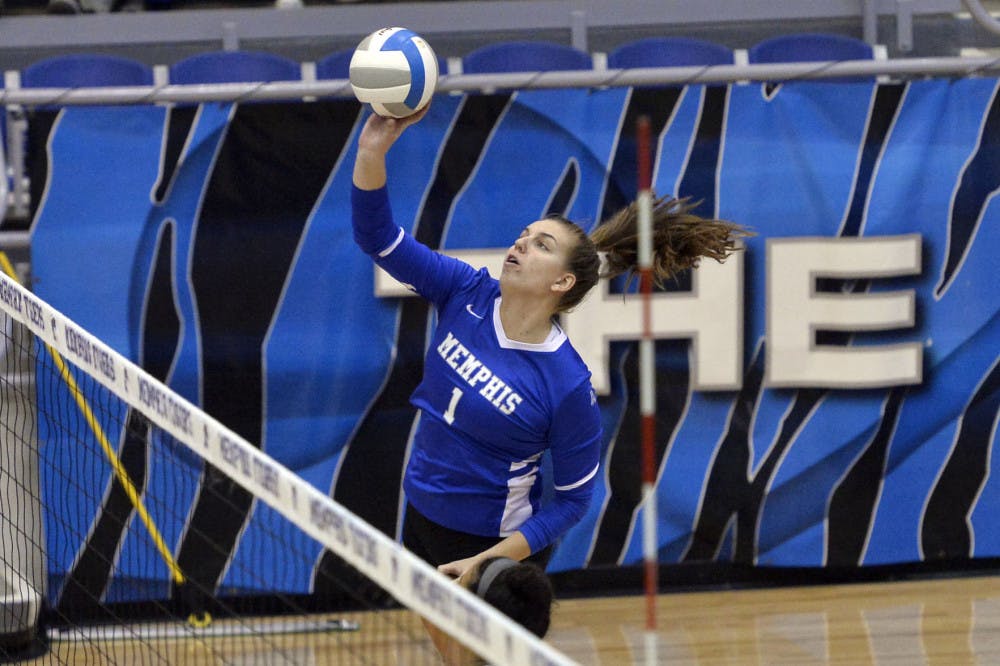 <p>Hannah Flowers goes for a powerful spike. The Memphis Tigers are currently undefeated to start the season with a 6-0 record.</p>