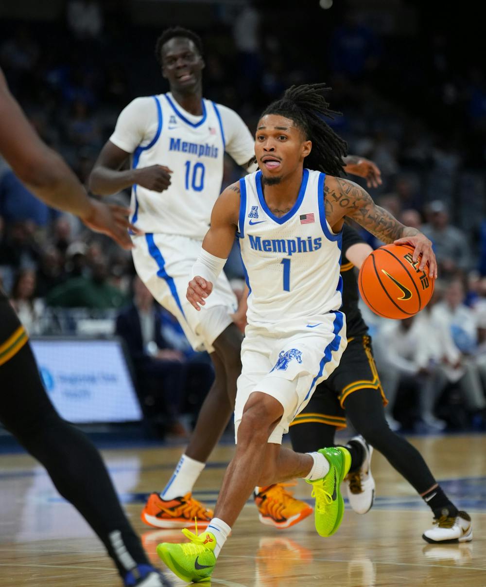 <p>Memphis guard Dug McDaniel dribbles around the perimeter in the Tigers&#x27; 76-70 win over San Francisco Saturday afternoon at FedExForum.﻿</p>