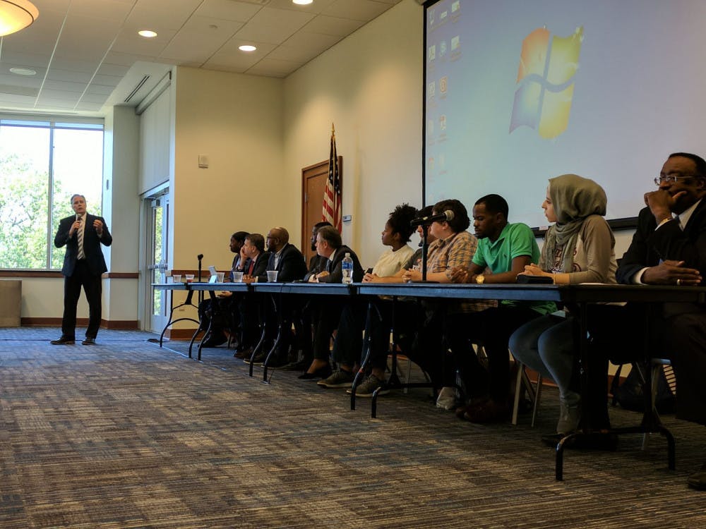 <p>Student Panelists Drew Gilmore, Rachel Crow, Dale Claybrone Jr., Abeer Abdelrahim, JaQuille Vennett and Marcus Dandridge listen to President M. David Rudd as he speaks about combating hate speech with good speech. Each student asked questions regarding campus safety.</p>