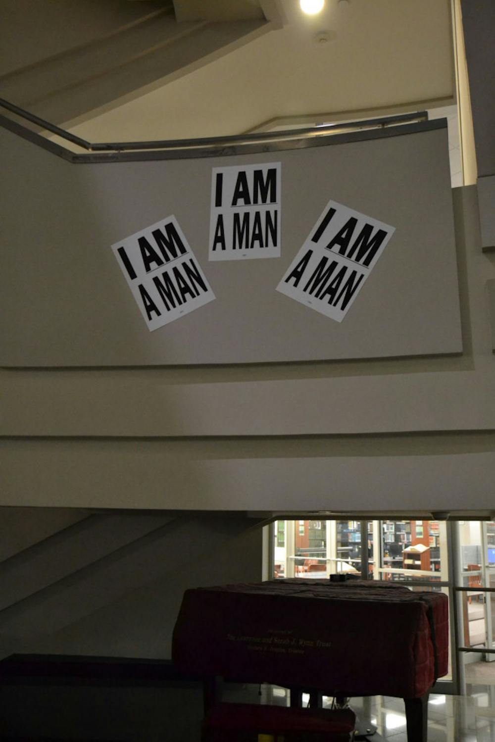 <p>Posters in the McWherter Library proclaim the "I Am A Man" slogan of the Memphis sanitation workers' strike of 1968. The library is hosting many MLK50 activities and events, including a film screening and an essay contest.</p>