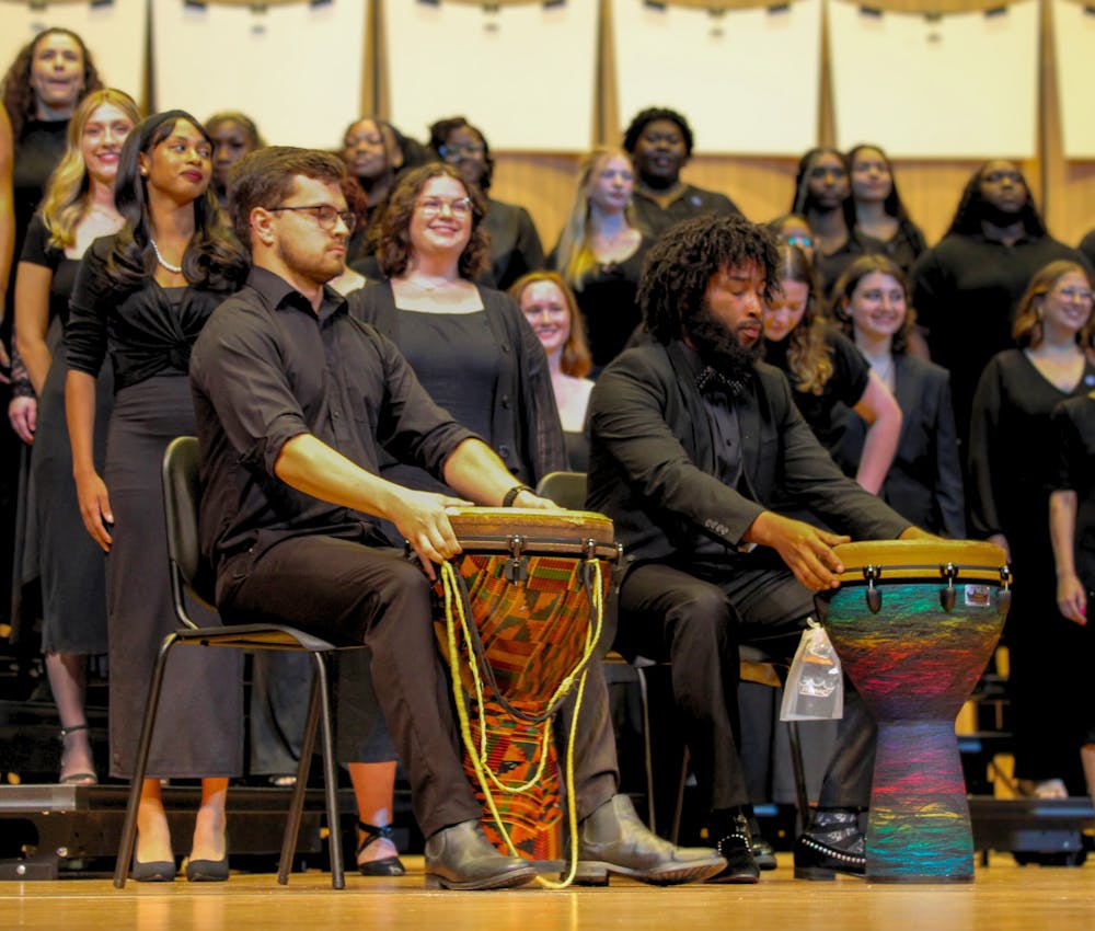 <p>Percussionists accompany the University of Memphis choir during the Choral Sampler performance.</p>