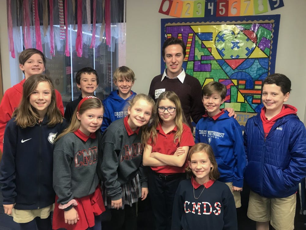 <p class="p1"><span class="s1"><strong><em>Helmsman</em> Editor-in-Chief Nick Lingerfelt spoke to a group of elementary school students at Christ Methodist Day School, a private school, who are taking an elective course called “Digital Newspaper.” Jane Donahoe, the school’s director of communications and who is also a former <em>Helmsman</em> reporter, teaches the class. Lingerfelt, an alumnus of CMDS, shared his experiences working at the campus paper and while in college.</strong></span></p>