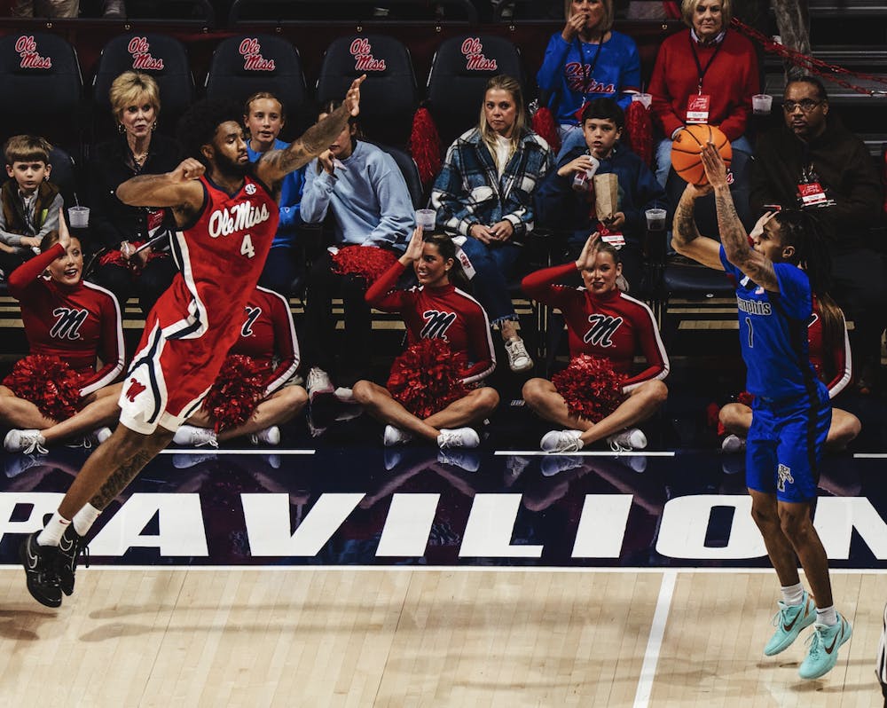 Memphis guard Dug McDaniel shoots a three in the Tigers' 83-77 loss at Ole Miss Tuesday night at the SJB Pavilion in Oxford.