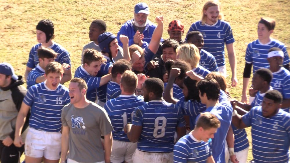 <p>The Memphis Tiger Rugby team celebrates after their victory against MTSU. The Tigers beat the Blue Raiders 27-15 to advance into the playoffs.</p>