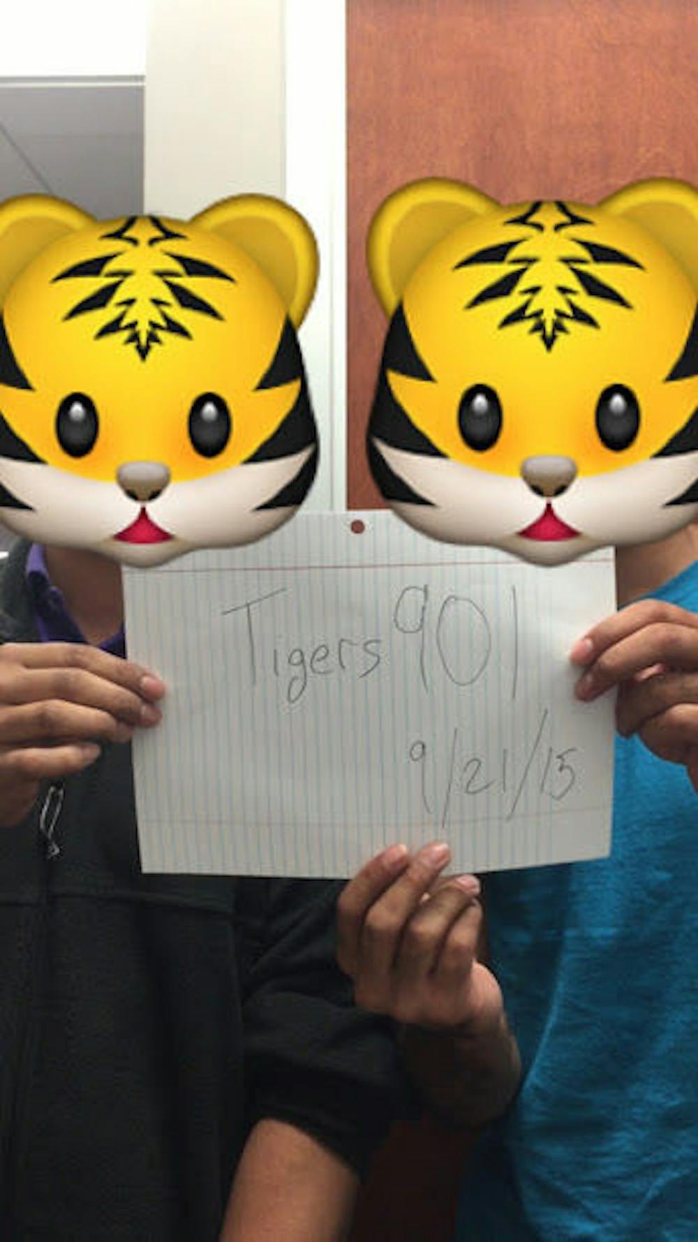 <p>The creators of Tigers901 snapchat page pose anonymously.</p>