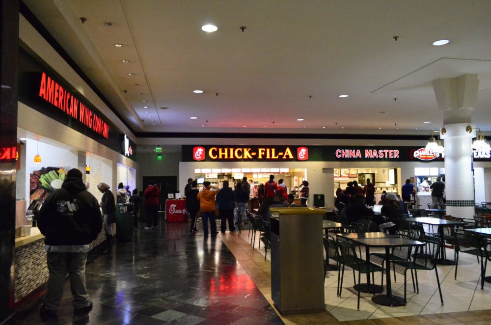 <p>Patrons stand in line at the food court in the Oak Court mall. Although the main incident over the break occurred at the Wolfchase Galleria, Oak Court, which is the mall closest to campus, has had its share of criminal activity.</p>