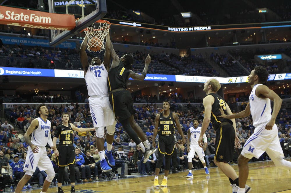 <p>Jeremiah Martin dunks against Wichita State. He had 16 points and 4 rebounds in the game.</p>
