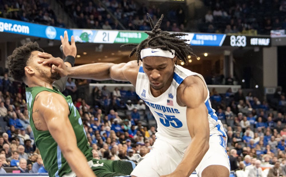 <p>Precious Achiuwa pushes a defender away as he is called for an offensive foul. Achiuwa ended with 14 points and 10 rebounds in the 84-73 win over Tulane on Dec. 30, 2019.&nbsp;</p>