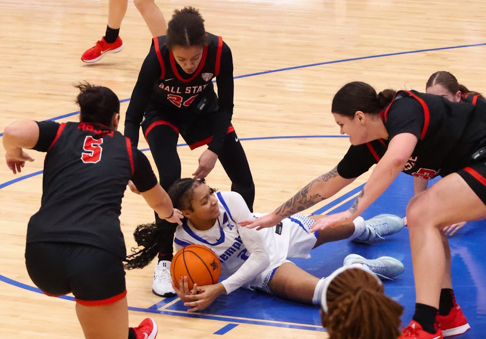 <p>Memphis guard Jordan Hunter guards the ball from a swarm of Ball State defenders in the Tigers&#x27; blowout loss at Elma Roane Fieldhouse Saturday afternoon.﻿</p>