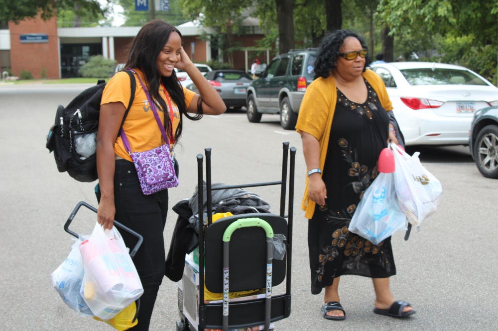 <p>Transfer student Ariel Devia is moving into her new dorms with the help of her mother. Devia moved into the LLC dorms.</p>