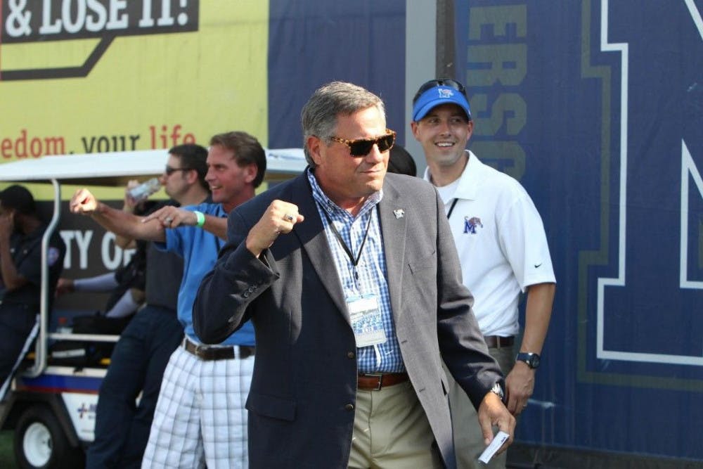 <p>The Tigers football team has given University of Memphis Athletic Director Tom Bowen plenty of reasons to be cheerful. In 2014, the Tigers finished with a 10-3 record and won a tri-share of the American Athletic Conference Championship. Photo by David Minkin&nbsp;</p>