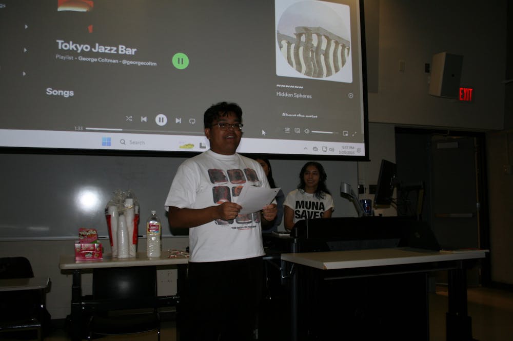 <p>University of Memphis student Justin Ignalig presenting his haiku.</p>