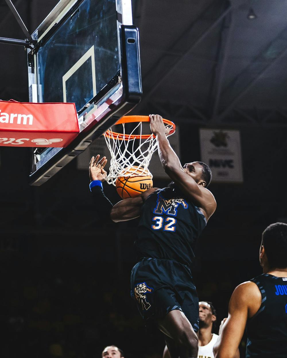 Memphis center Moussa Cisse dunks in the Tigers' overtime defeat at Wichita State on Sunday, February 16, 2025.