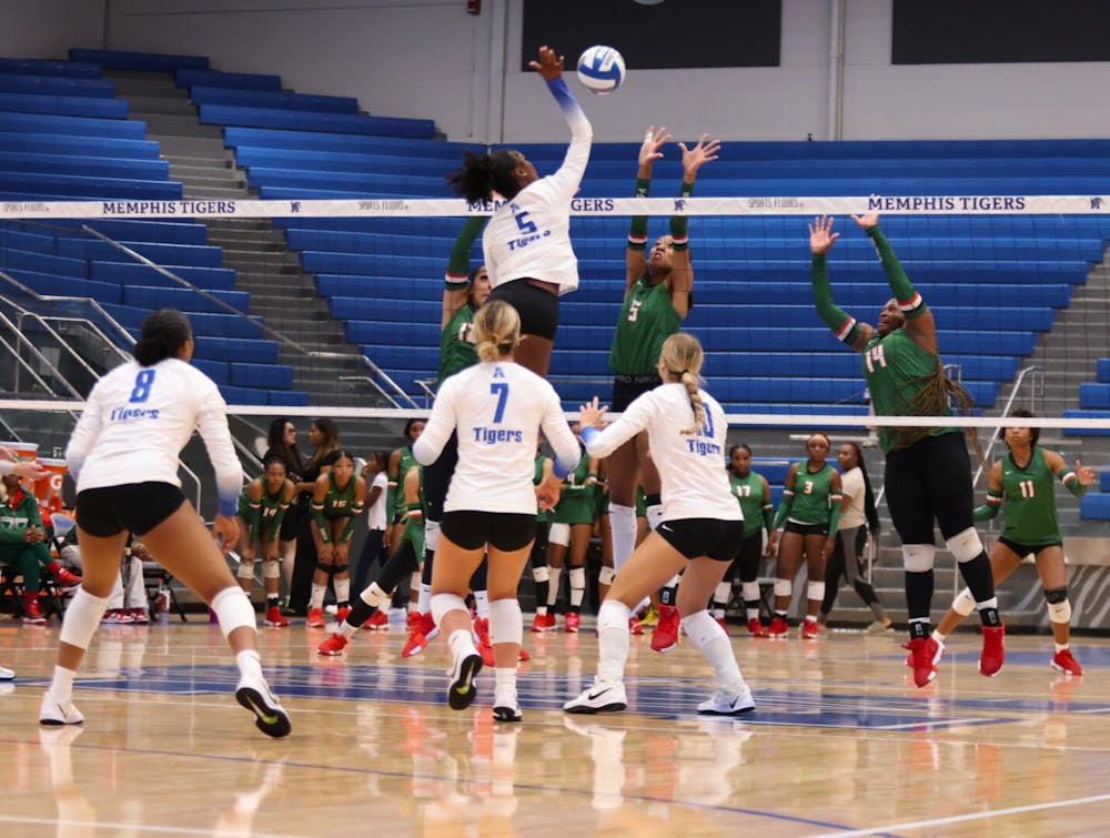 <p>Memphis&#x27; Brianna Washington spikes the ball over the net in the Tigers&#x27; straight-sets victory over MVSU Tuesday night at Elma Roane Fieldhouse.﻿</p>