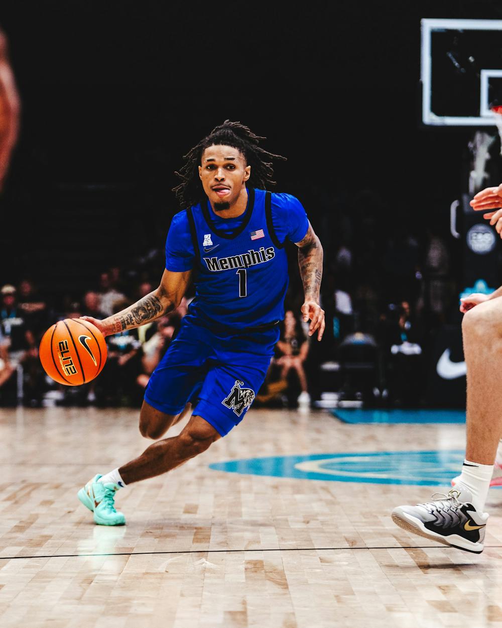 <p>Memphis point guard Dug McDaniel drives by a Purdue defender in the Tigers&#x27; 80-71 loss to the Boilermakers on Nov. 20, 2025 in the Bahamas. McDaniel finished with 18 points to lead the Tigers.</p>