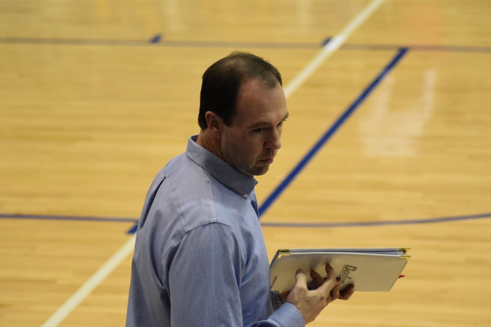 <p>Head coach Sean Burdette looks back at his assistants to call a play for his team. Burdette is in his second season at Memphis and has led his team to a winning record so far this season.&nbsp;</p>