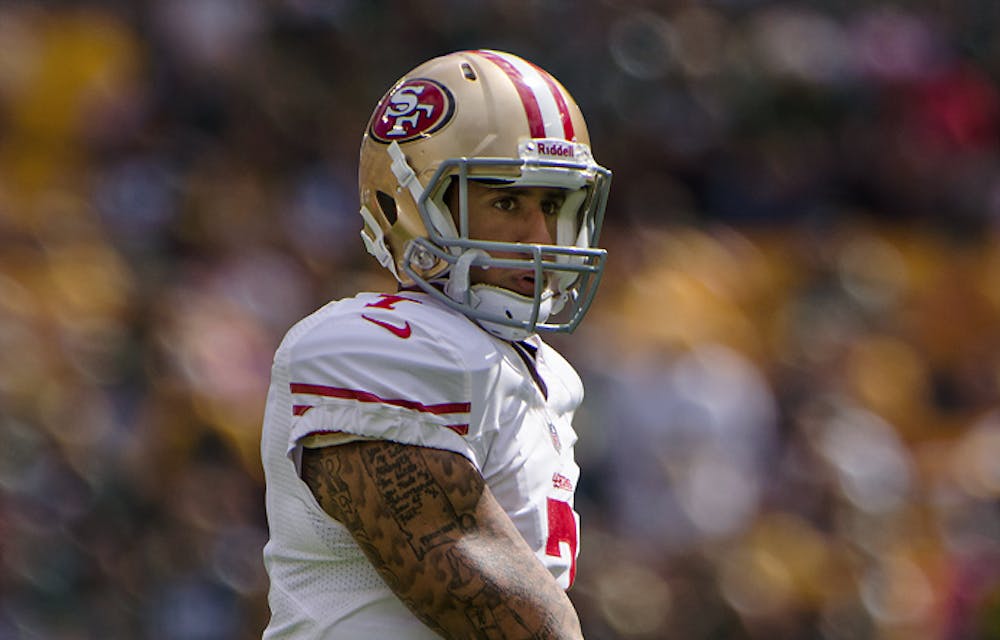 <p>49ers' quarterback Colin Kaepernick refused to stand for the national anthem. He is protesting against law enforcement violence towards African Americans.</p>