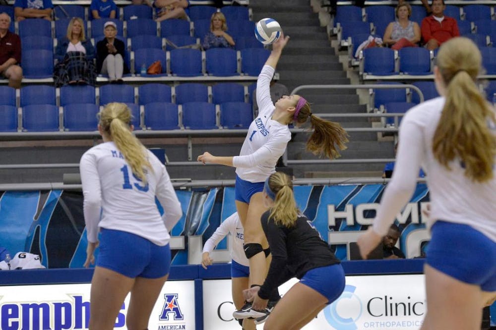 <p>Hannah Flowers jumps to hit the ball. The freshman has 168 kills in 17 matches this season.</p>