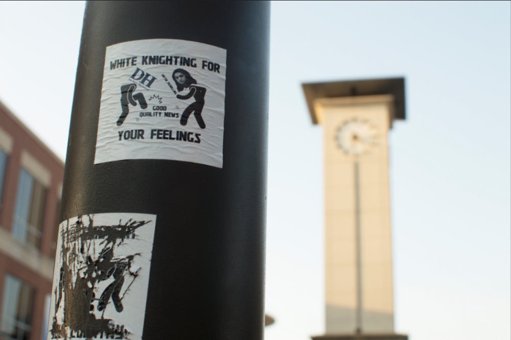 <p>Stickers depicting our editor-in-chief Jonathan Capriel and the Daily Helmsman as stick figures beating up "good quality news" have appeared in at least seven locations on campus. The art is borrowed from artist Leremy Gan, who originally created the stick figures. &nbsp;</p>