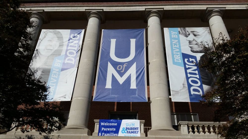 Banners at the Admin Building University of Memphis Campus