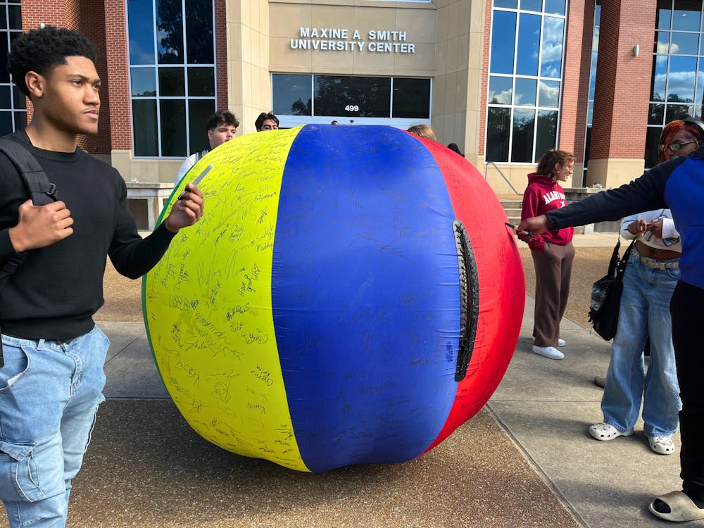 A gigantic beachball sits in front of the University Center so students with sharpies can sign their signatures onto it for less than a dollar.