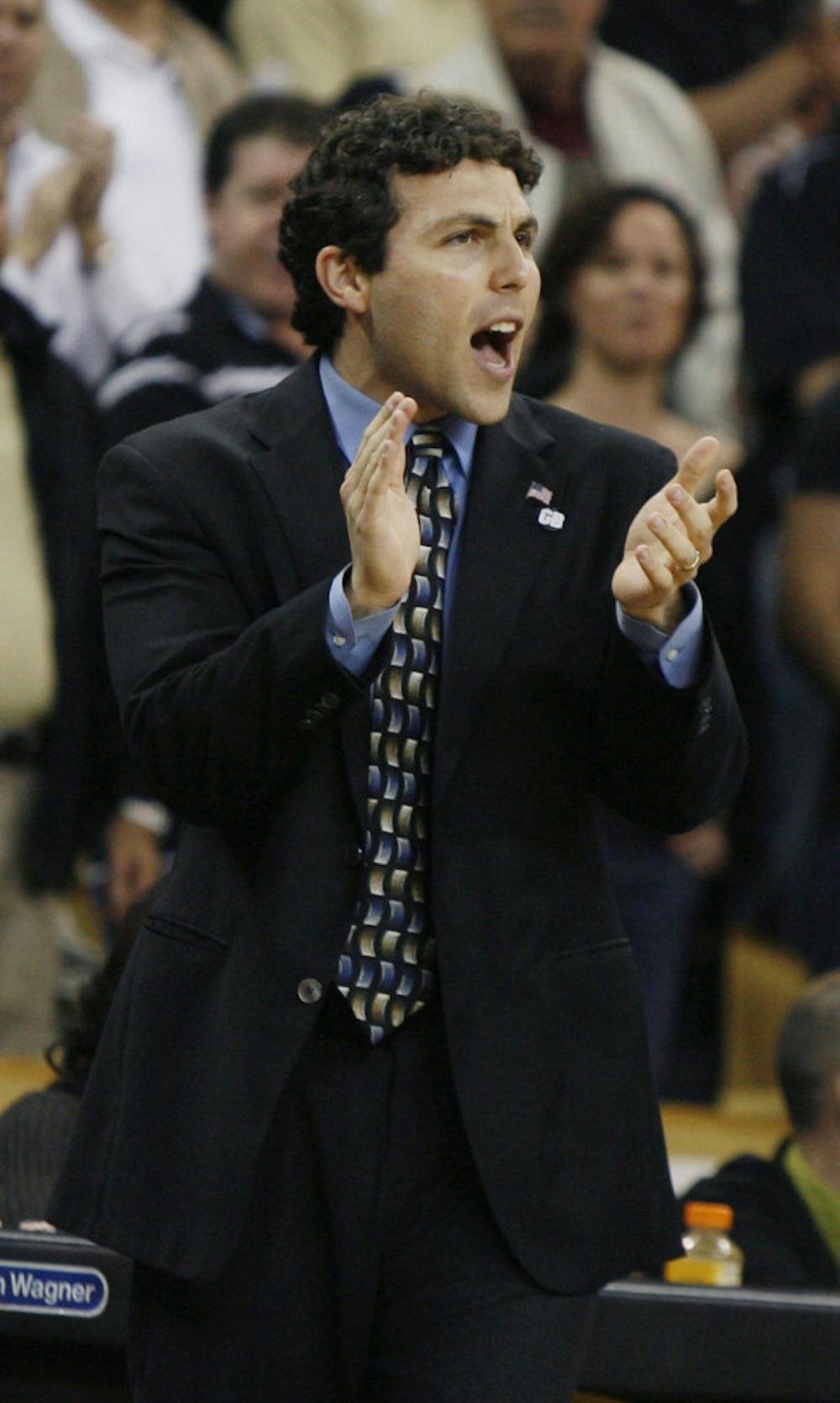 <p>Memphis head coach Josh Pastner urges on his squad against Central Florida at the UCF Arena in Orlando, Florida, on Wednesday, January 18, 2012. (Stephen M. Dowell/Orlando Sentinel/MCT)</p>