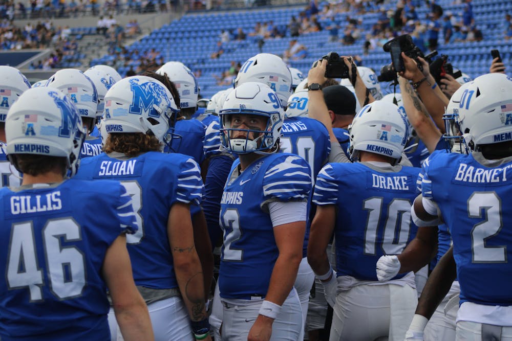 Memphis Football huddles up before their 40-0 route over North Alabama.