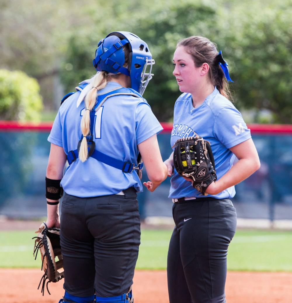 <p>Catcher Regan Hadley talks to pitcher Molly Smith. Smith has a 1.49 ERA this season and has pitched 169 strikeouts to Hadley.</p>