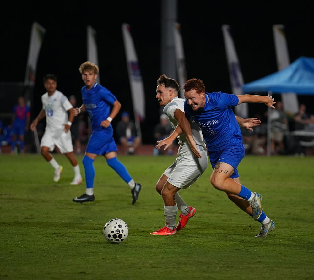 <p>Memphis defender ﻿Dominic Breidenbach battles with an FGCU player for possession in the Tigers&#x27; 3-1 defeat at home earlier this season.</p>