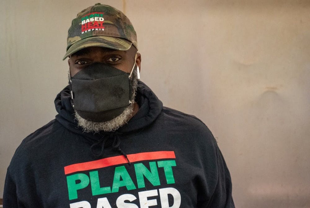 <p class="c1">Owner of Plant Based Heat, RJ Groove sports his restaurant’s merchandise while prepping for the day. “Plant Based Heat is my heart and soul,” he said.</p>