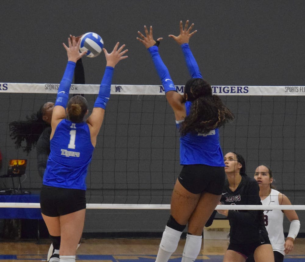 <p>Two Tigers go for a block in Memphis&#x27; 3-0 victory over Alabama A&amp;M Wednesday.﻿</p>