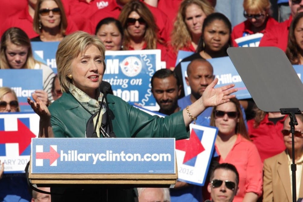<p><span>During a rally at Market Square in Alexandria, Va., on Friday, Hillary Clinton tells the crowd, “Your fights are my fights, and I won’t quit until all Americans have a chance to get ahead and stay ahead.” SHFWire photo by Kelvin Suddason</span></p>