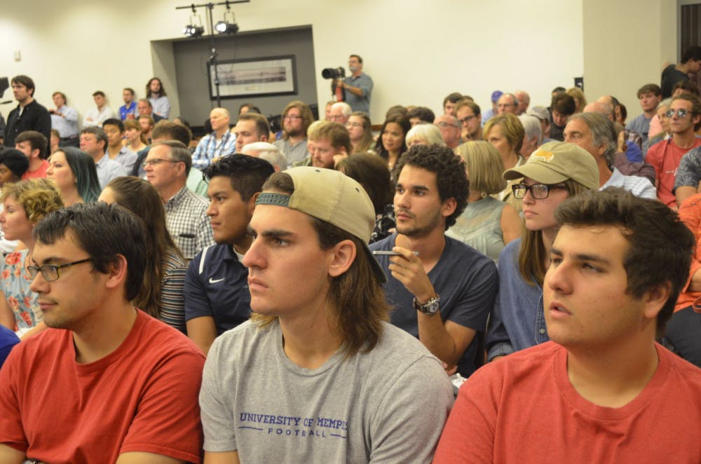 <p>Audience members listen to Dinesh D’Souza’s speech. The Young Americans for Freedom hosted the event.&nbsp;</p>