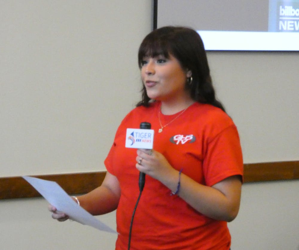 <p>A student delivers a mock news report during the Tennessee High School Press Association Fall 2025 Workshop at the University of Memphis.</p>