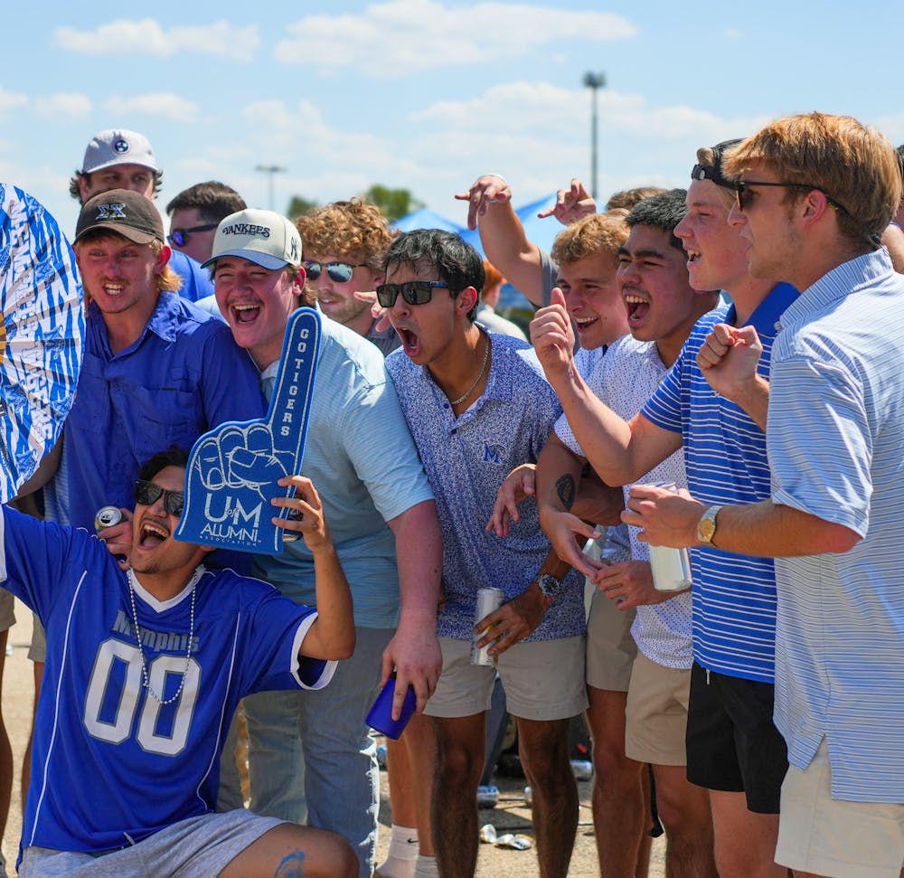 <p>Memphis fans cheer and pose for photos at Tiger Lane while tailgating before the Tigers’ season opener against Chattanooga on Saturday.<br/><br/></p>
