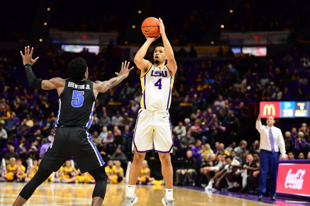 <p><span>Skylar Mays, 4, shoots over Kareem Brewton Jr. Mays led the LSU Tigers with 19 points.</span></p>