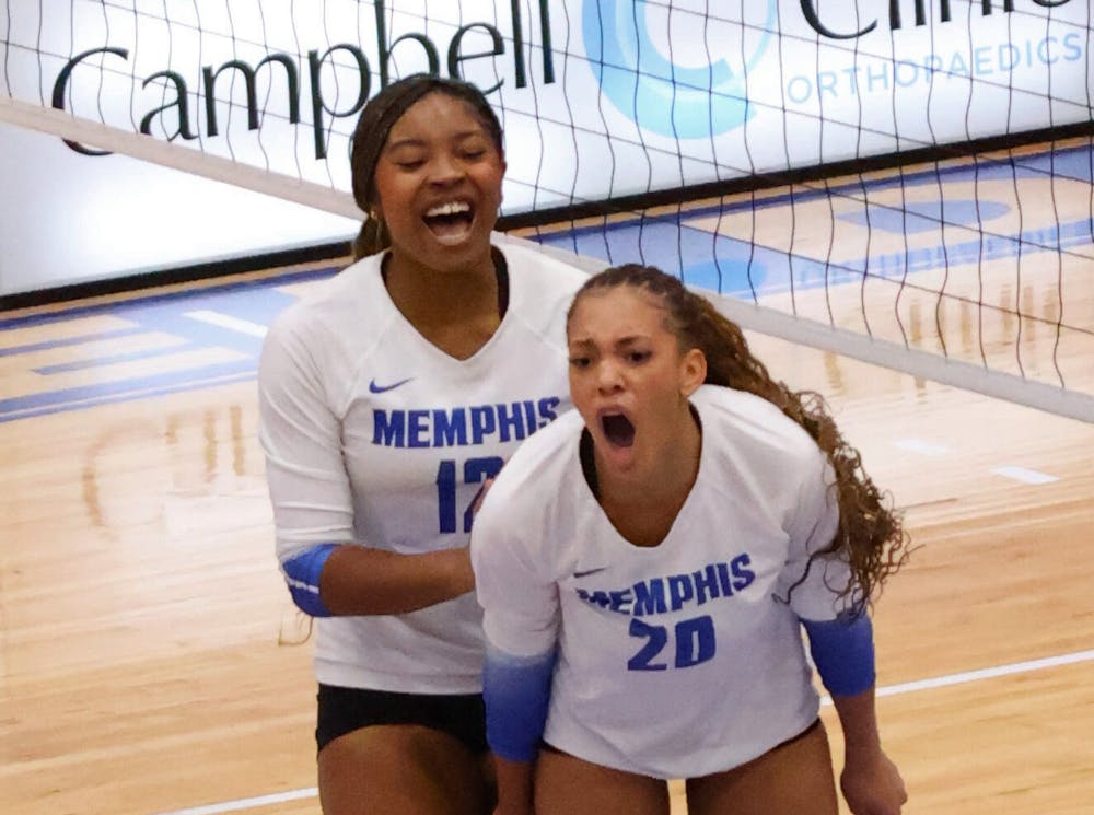 <p>Memphis&#x27; Zaniah Hoskins (20) celebrates winning a point in a home game earlier this month. Hoskins led the Tigers with 8 kills at Charlotte.﻿</p>