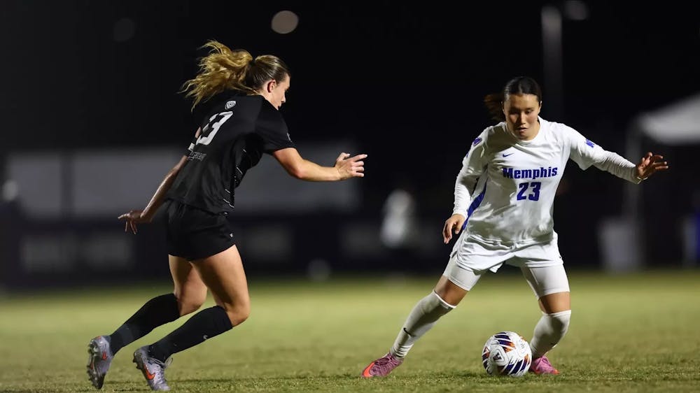 Memphis midfielder Ai Kitagawa evades a UTSA defender in the Tigers' 3-3 penalty shootout defeat Thursday night in Florida.