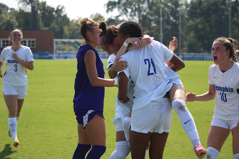 Anne-Valerie Seto celebrates with her teammates after her goal against East Carolina.