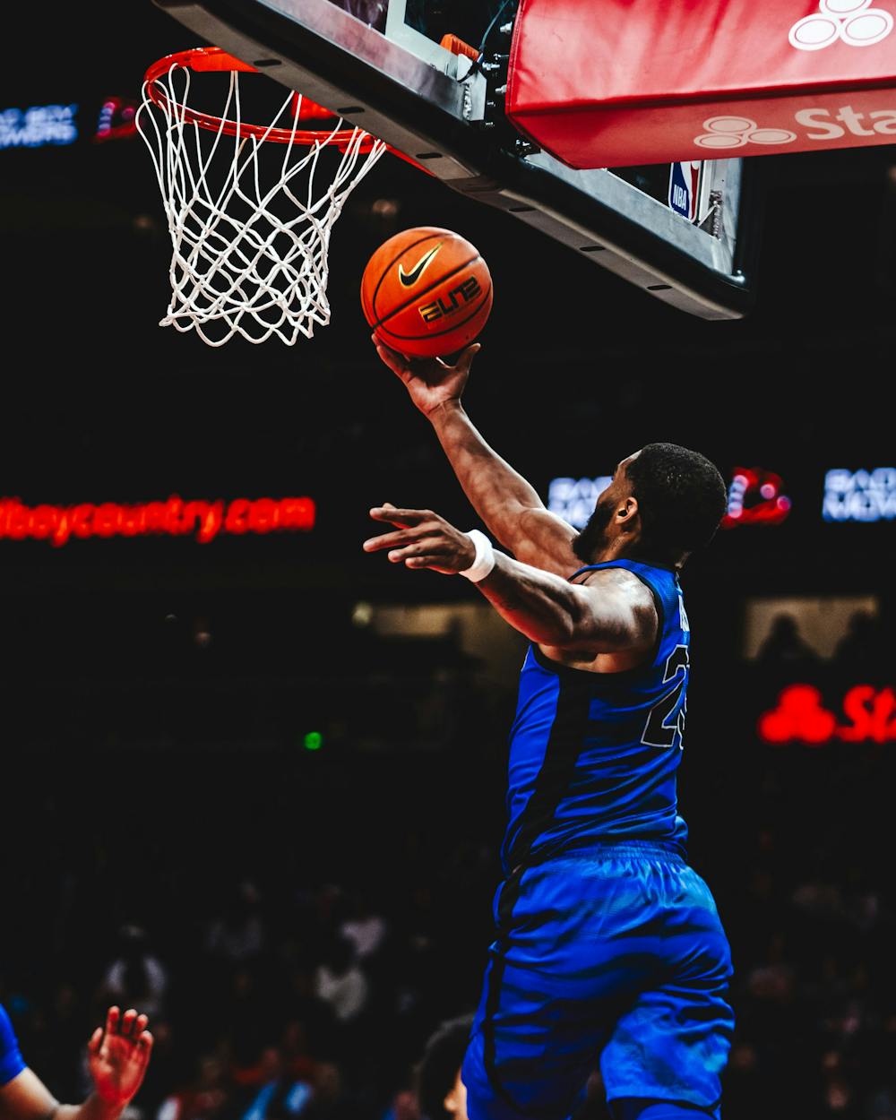 Memphis guard Sincere Parker, who led the Tigers with 19 points, hits a reverse layup in the first half of Memphis' blowout loss to Auburn in Atlanta Thursday night.