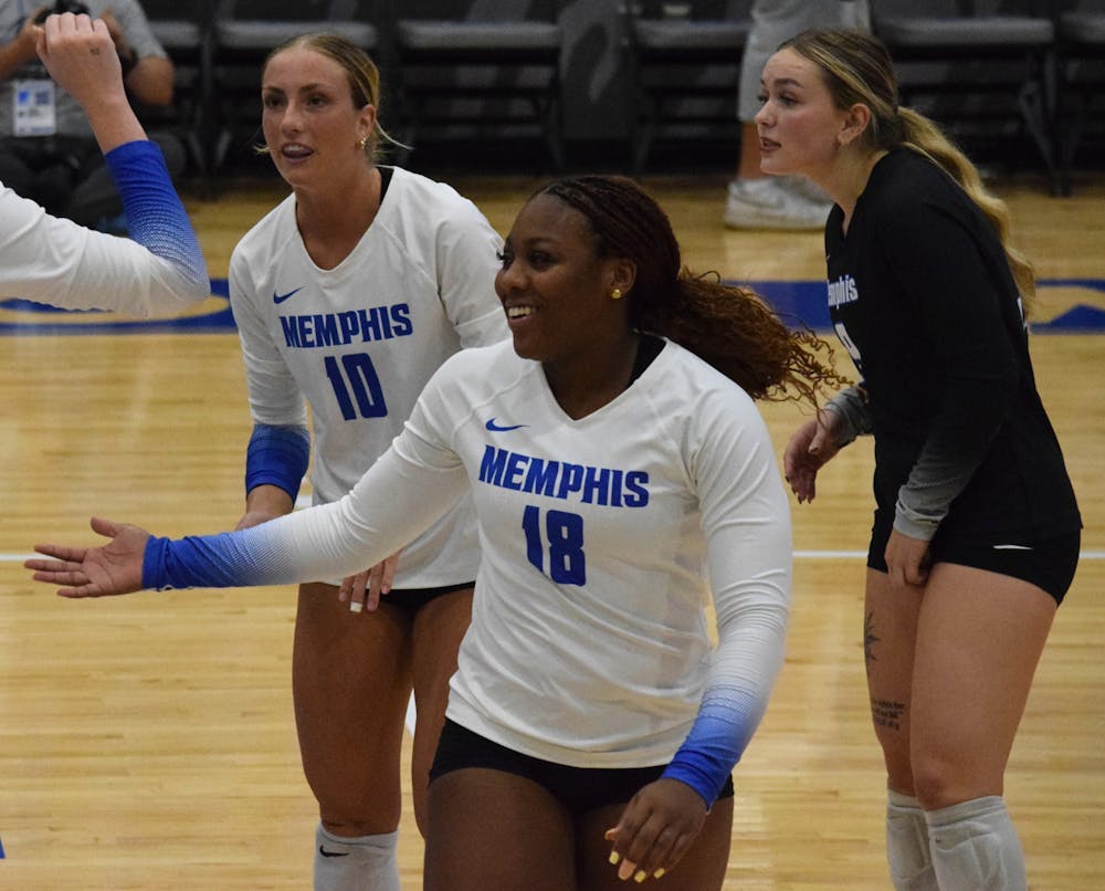 <p>Memphis&#x27; Za&#x27;Niya Brooks celebrates after a point in the Tigers&#x27; 3-1 victory of Chattanooga Thursday night.﻿</p>