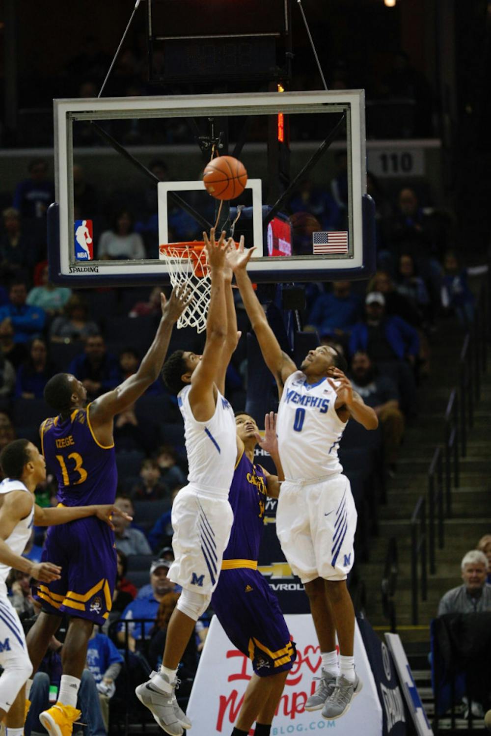 <p>Dedric and K.J. out jump the opposing team for the rebound. They are averaging a combined 32 points and 18 boards per game.</p>