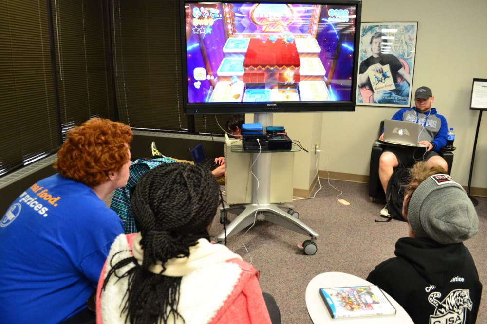 <p>University of Memphis students Ariella Akemon, Bailey Craig, and Tyler Earnest play Super Mario Bros on the Wii U. The Nintendo Switch will release games in the Mario franchise, such as Super Mario Odyssey and Mario Kart 8 Deluxe.</p>