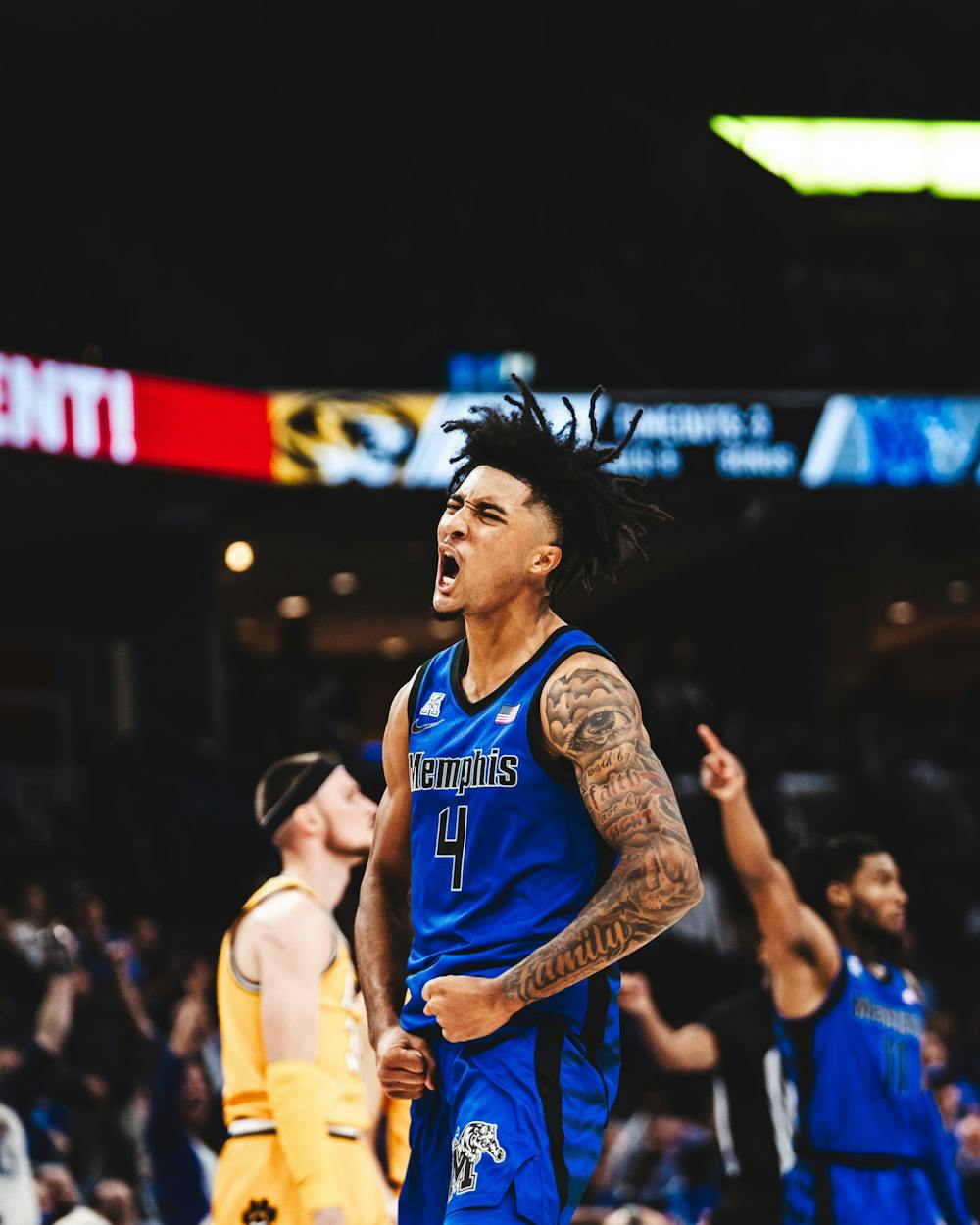 Memphis point guard PJ Haggerty celebrates an and-one layup in the Tigers' victory over Missouri.