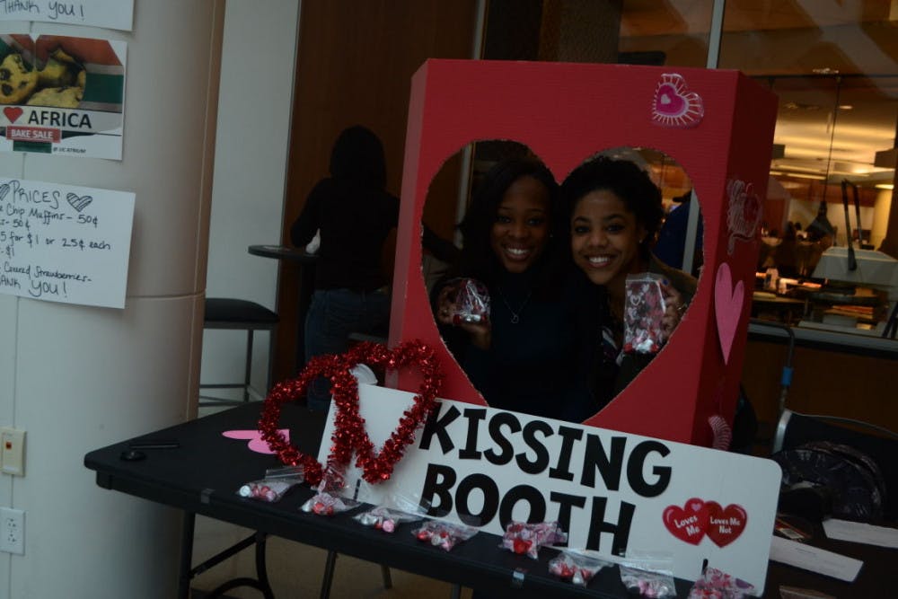 <p class="p1">Raven Lewis and Raven Jones, fundraising co-chairs of the NAACP Memphis Chapter, are operatinga “kissing booth” to raise money for their chapter. Although, not a kissing booth in the traditional sense of the word, this booth only handed out bags of the eponymous candy.</p>