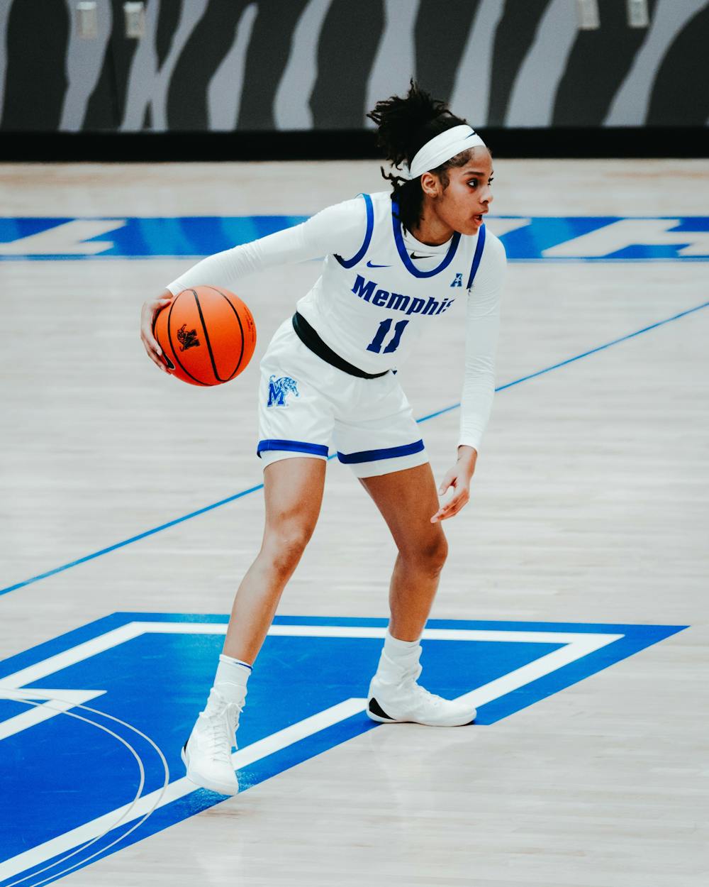 <p>Tanyuel Welch brings the ball up the court to initiate the offense. She finished the﻿ the game with 13 points and three assists.</p>