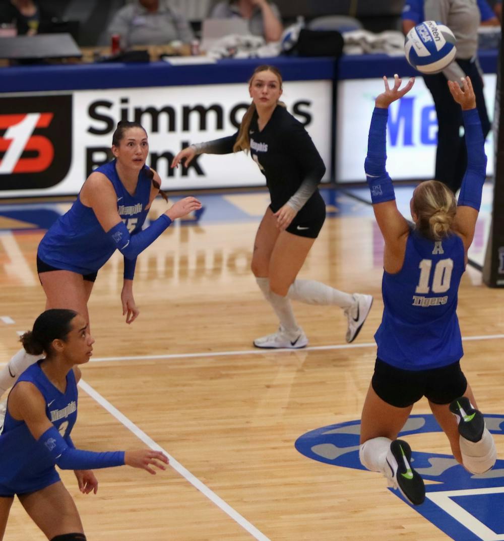 <p>Memphis setter Maddy Bach plays a ball to her teammates in the Tigers&#x27; 3-1 victory over UT Martin Saturday at Elma Roane Fieldhouse.﻿</p>