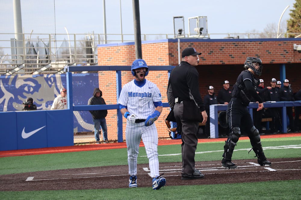 Memphis infielder Creek Robinson celebrates after scoring a run in the first game of the season on February 14.