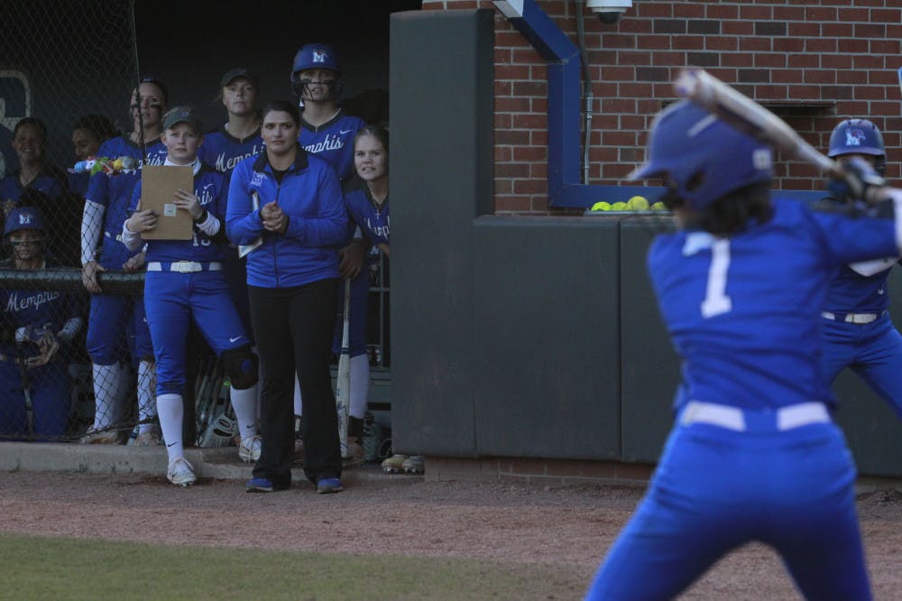 <p>Baylee Smith gets set to swing as her team watches from the dugout. Smith is a left fielder and has a .409 batting average and has 26 stolen bases</p>